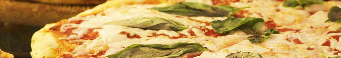 Eating Italian Pizza Sandwich at Pizza Boli's restaurant in Philadelphia, PA.